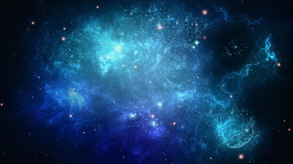 Blue nebula and stars against a dark sky.
